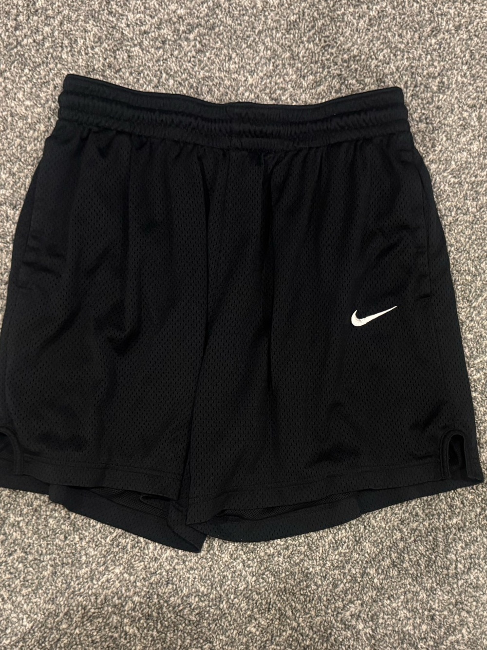 Nike Black Men's Athletic Mesh Shorts with White Swoosh